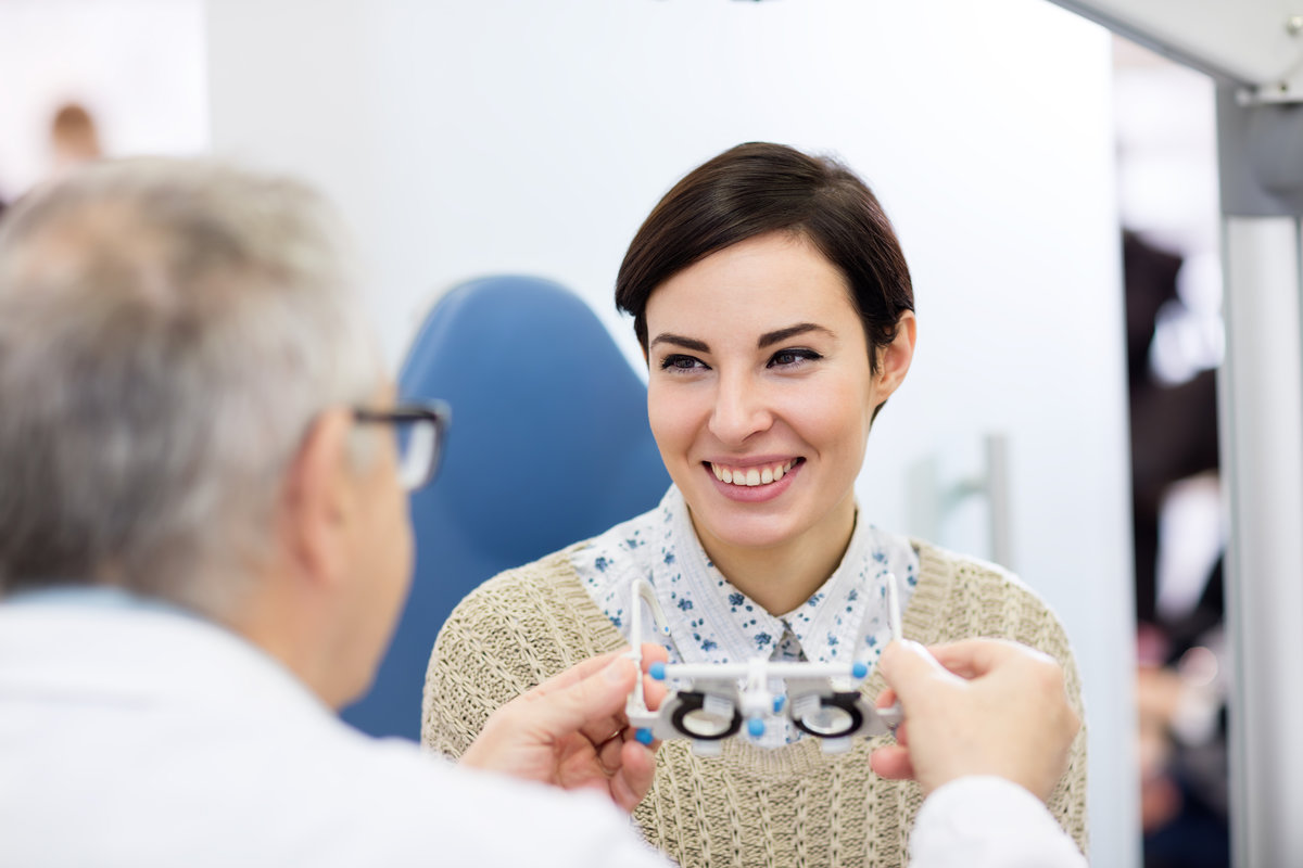 Pretty girl at ophthalmologist on eye control