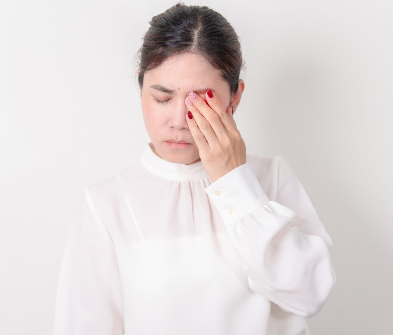 Business Woman having Eye pain and Irritation for concepts of Eye disease, Cataract, Glaucoma, Age Related Macular Degeneration, Diabetic Retinopathy, dry eyes, Conjunctivitis, World Glaucoma day