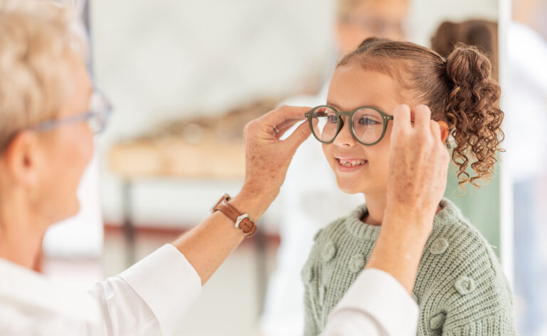Vision, eye care glasses and child with optometrist for ophthalmology consultation, help or support with eyesight. Healthcare service, optical check and expert consulting youth patient at eye exam.