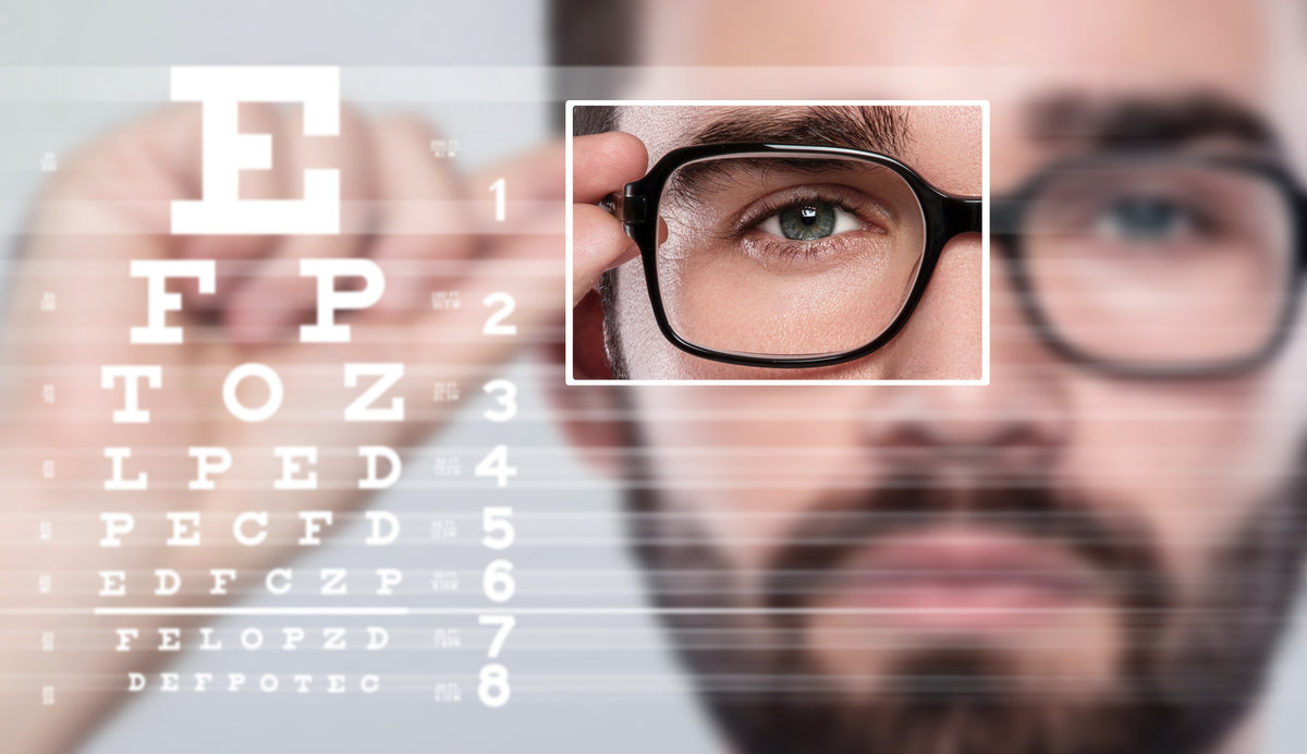 Male face and eye chart. Eyesight concept